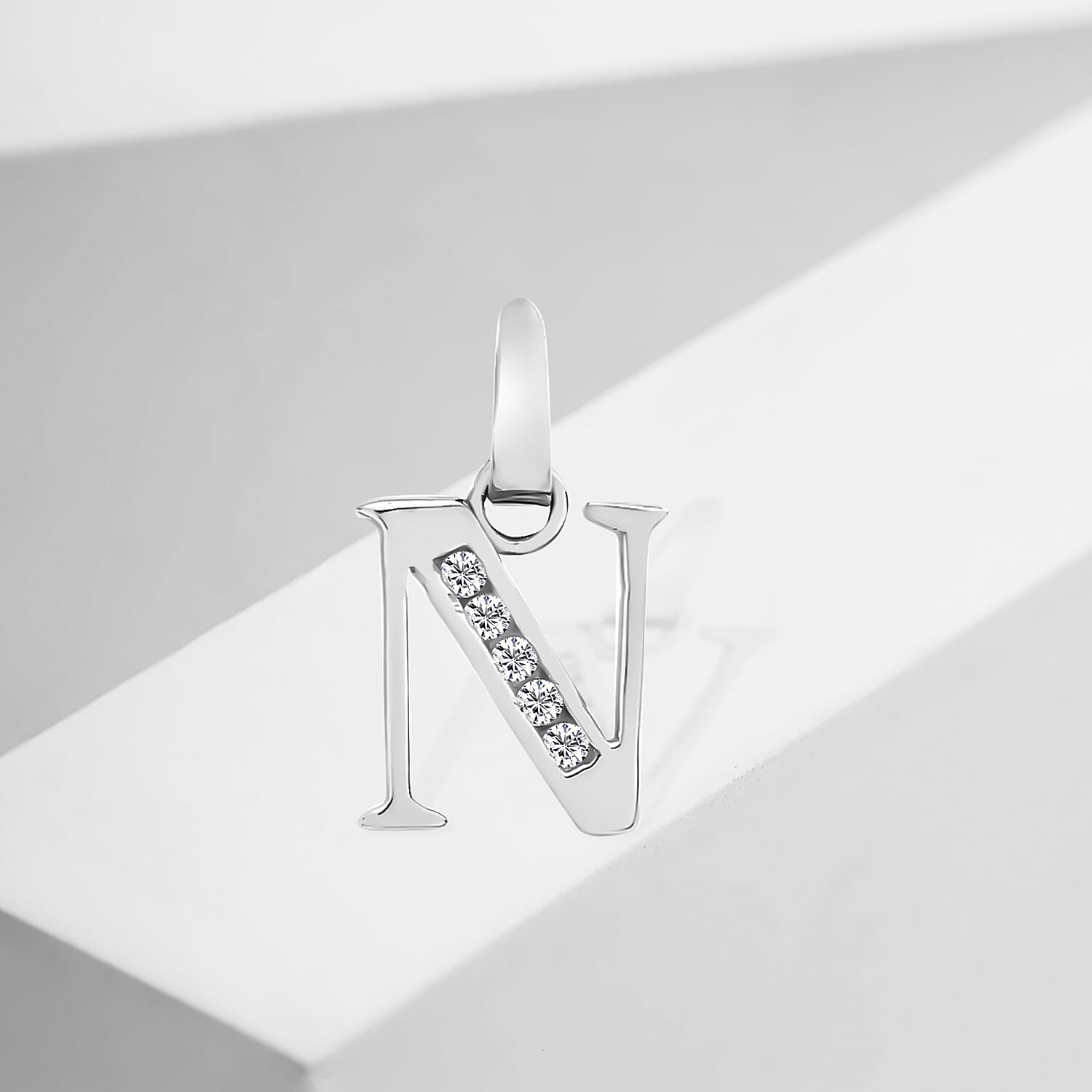 9K White Gold  A   Cubic Zirconia  Pendant 0.03 ct,  Gold Wt. 0.36 Gms  0.025  Ct.