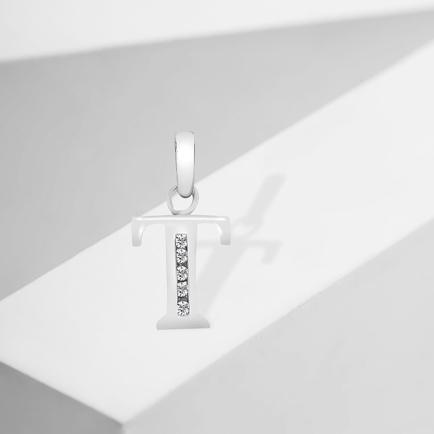 9K White Gold  A   Cubic Zirconia  Pendant 0.03 ct,  Gold Wt. 0.39 Gms  0.025  Ct.