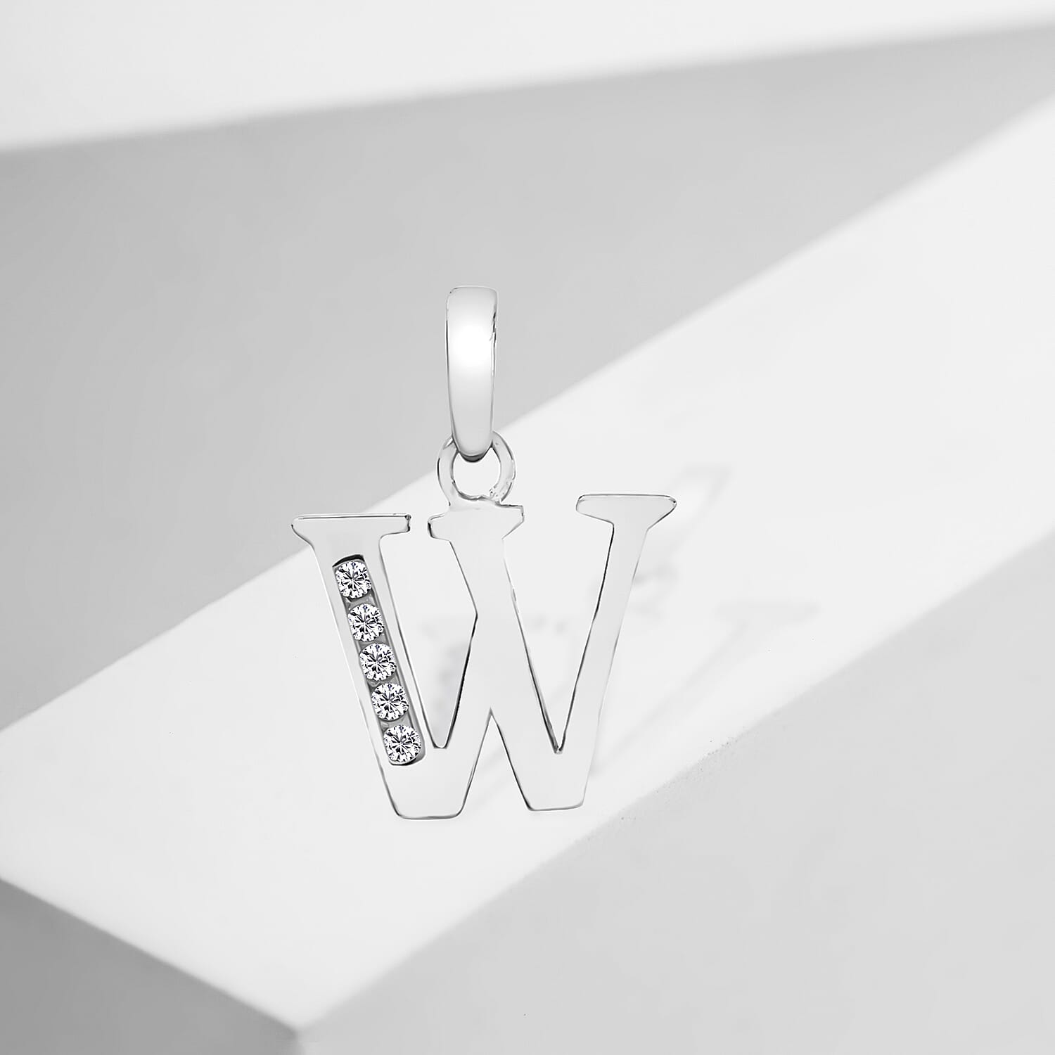 9K White Gold  A   Cubic Zirconia  Pendant 0.03 ct,  Gold Wt. 0.57 Gms  0.025  Ct.