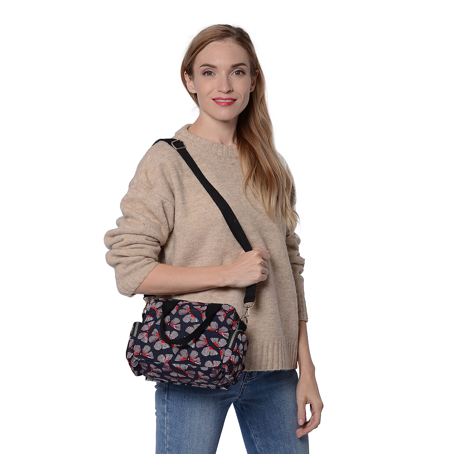 Butterfly pattern cross body bag This multi-pocket cross body bag has ample room to carry all your essentials for outdoor activity Exterior is made of high quality nylon fabric Polyester 
