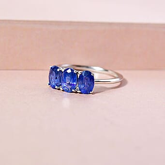 https://tjcuk.sirv.com/Products/74/4/7442424/Fissure-Filled-Blue-Sapphire-Trilogy-Ring-in-Platinum-Overlay-Sterling_7442424_1.jpg?w=342&h=342