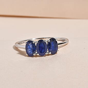https://tjcuk.sirv.com/Products/74/4/7442428/Fissure-Filled-Blue-Sapphire-Trilogy-Ring-in-Platinum-Overlay-Sterling_7442428_1.jpg?w=342&h=342