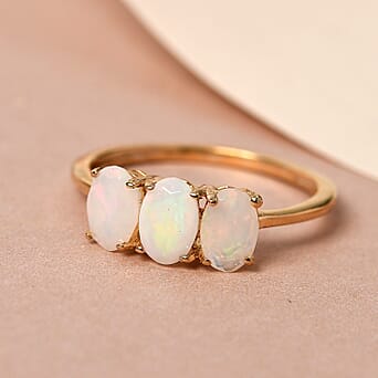 https://tjcuk.sirv.com/Products/74/4/7442451/Ethiopian-Welo-Opal-Trilogy-Ring-in-18K-Vermeil-Yellow-Gold-Overlay-St_7442451_1.jpg?w=342&h=342