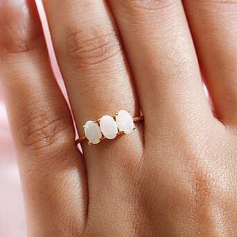 https://tjcuk.sirv.com/Products/74/4/7442451/Ethiopian-Welo-Opal-Trilogy-Ring-in-18K-Vermeil-Yellow-Gold-Overlay-St_7442451_2.jpg?w=342&h=342