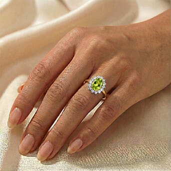 https://tjcuk.sirv.com/Products/74/4/7442594/Hebei-Peridot-August-Birthstone-Halo-Ring-with-Natural-Cambodian-Zirco_7442594_2.jpg?w=342&h=342