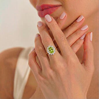 https://tjcuk.sirv.com/Products/74/4/7442594/Hebei-Peridot-August-Birthstone-Halo-Ring-with-Natural-Cambodian-Zirco_7442594_3.jpg?w=342&h=342