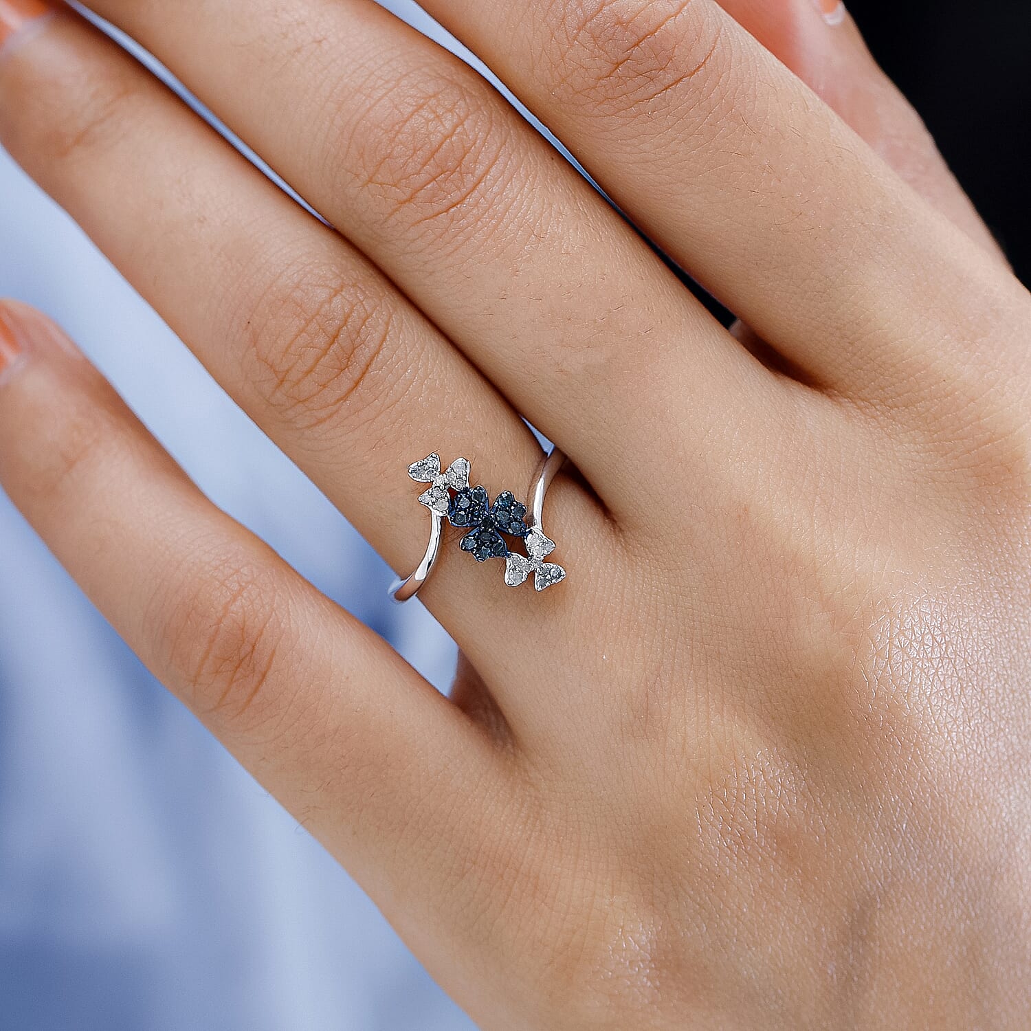 White Diamond and Blue Diamond Ring in Platinum Overlay Sterling Silver 0.21 Ct