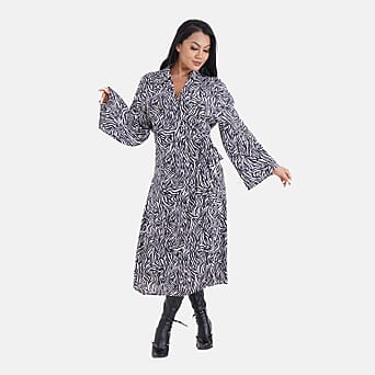 https://tjcuk.sirv.com/Products/75/1/7513360/Tamsy-100-Viscose-Woven-Midi-Wrap-Dress-Size-M-Black-White_7513360_3.jpg?w=342&h=342