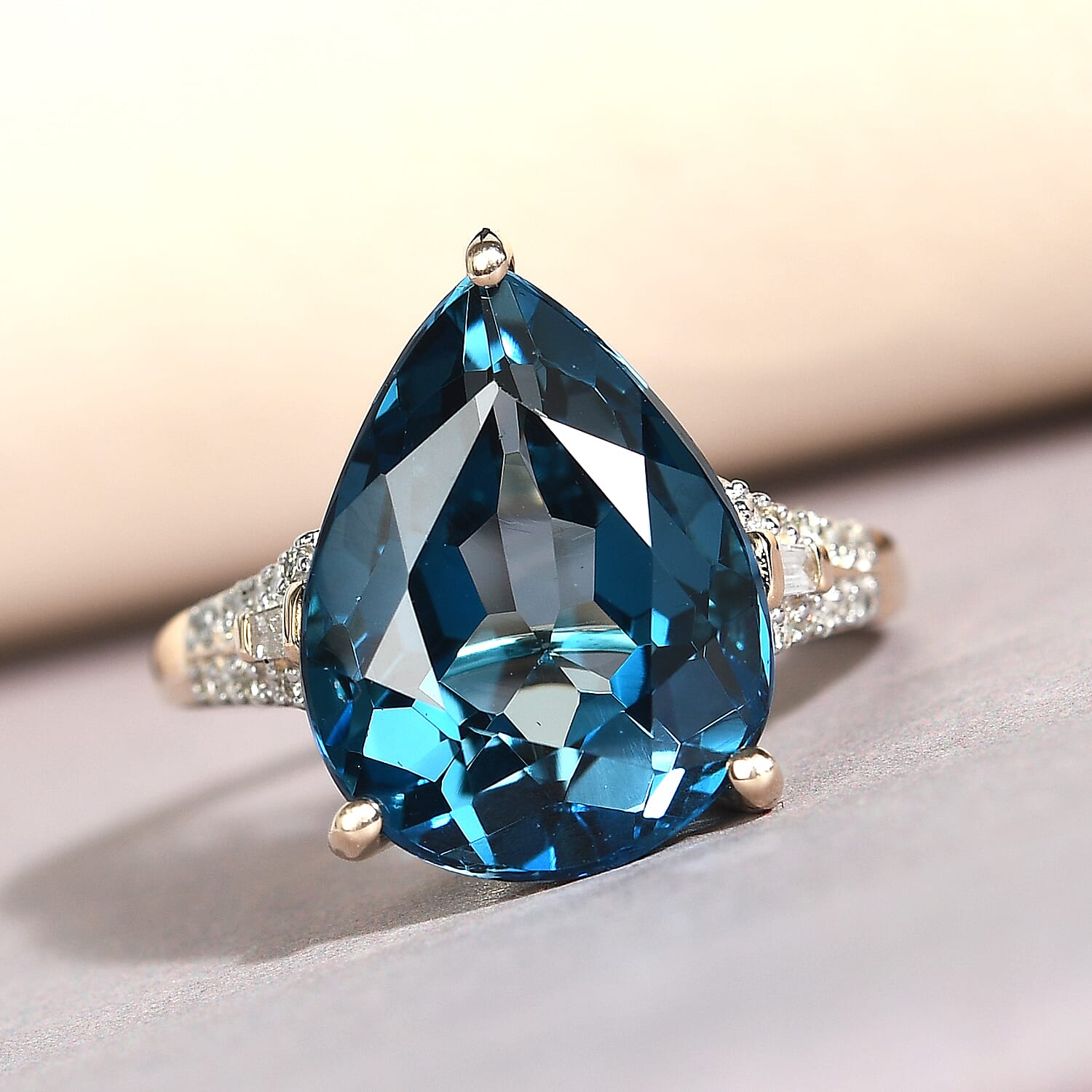 9K Yellow Gold Marambaia London Blue Topaz (Pear 16x12mm, 10.81 Ct) and Diamond (0.25 Ct.) Ring 11.06 Ct.