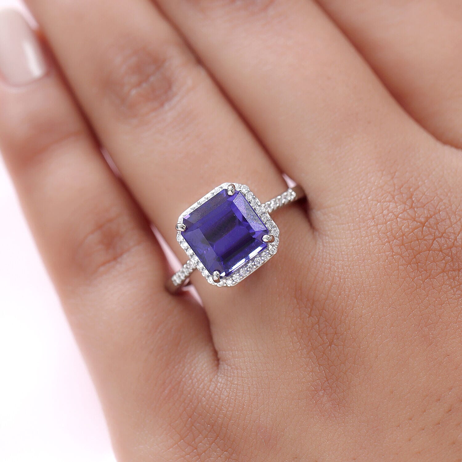 RHAPSODY 950 Platinum AAAA Tanzanite and Diamond( VS-E-F) Ring 5.55 Ct, Platinum Wt. 5.40 Gms RHAPSODY 950 Platinum AAAA Tanzanite and Diamond( VS-E-F) Ring 5.55 Ct, Platinum Wt. 5.40 Gms