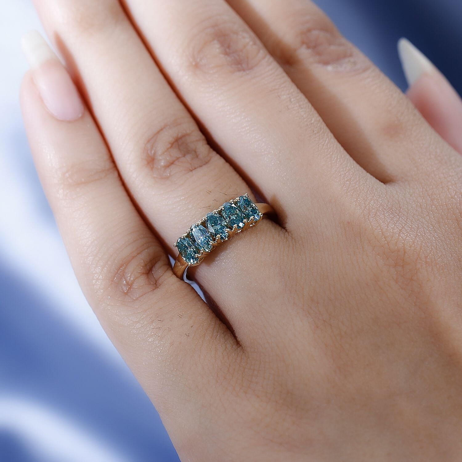 9K Yellow Gold Blue Moissanite Ring 1.13 Ct.