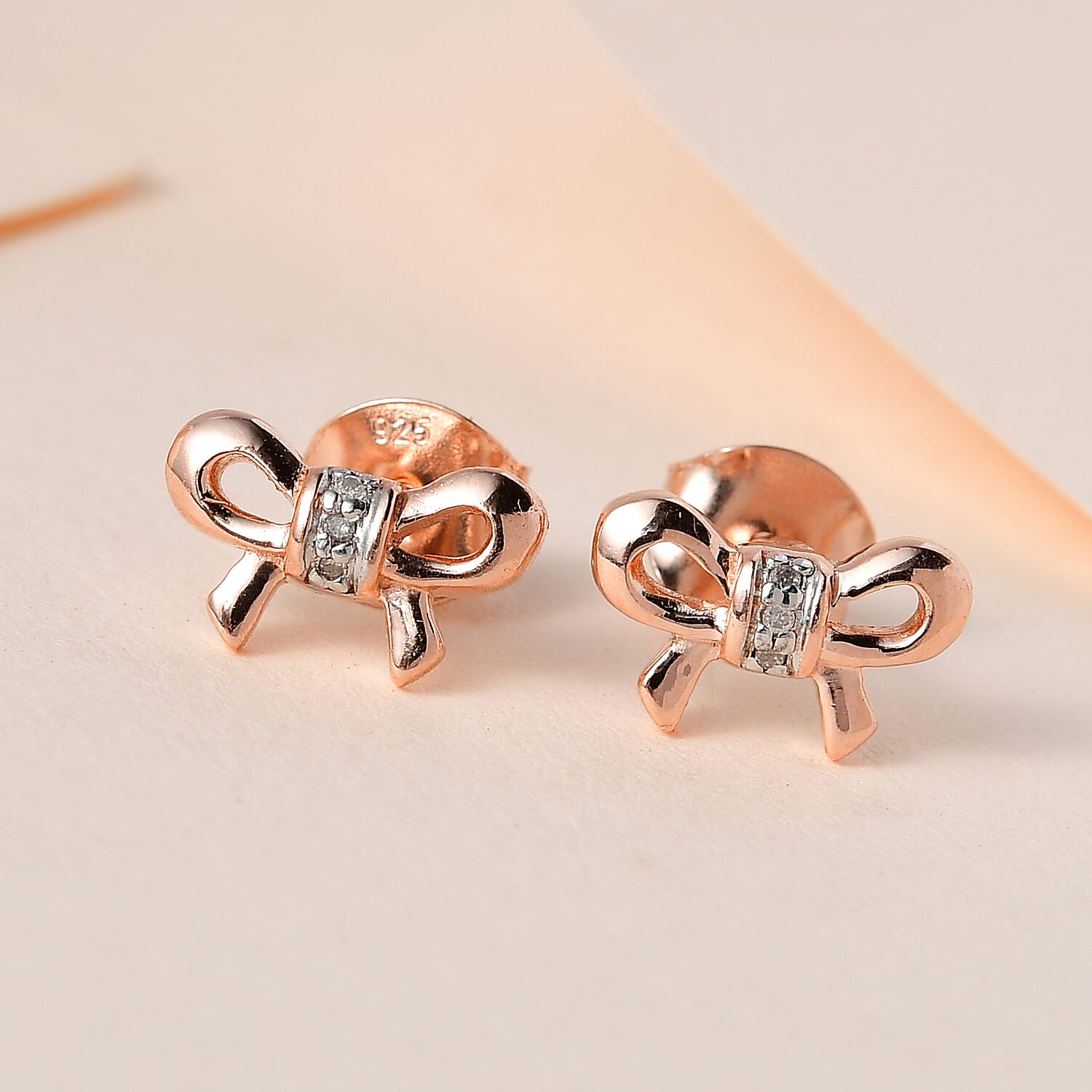 Diamond Bow Stud Earrings in 18K Rose Gold Vermeil Plated Sterling Silver