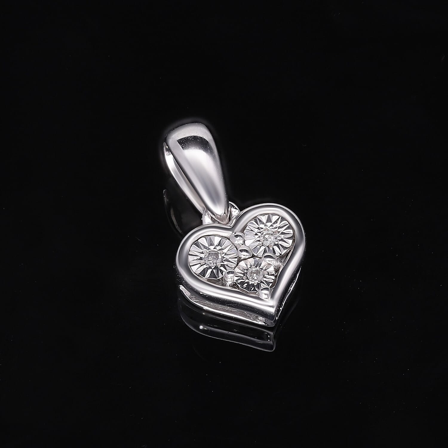 Diamond Heart Pendant in Platinum Overlay Sterling Silver.