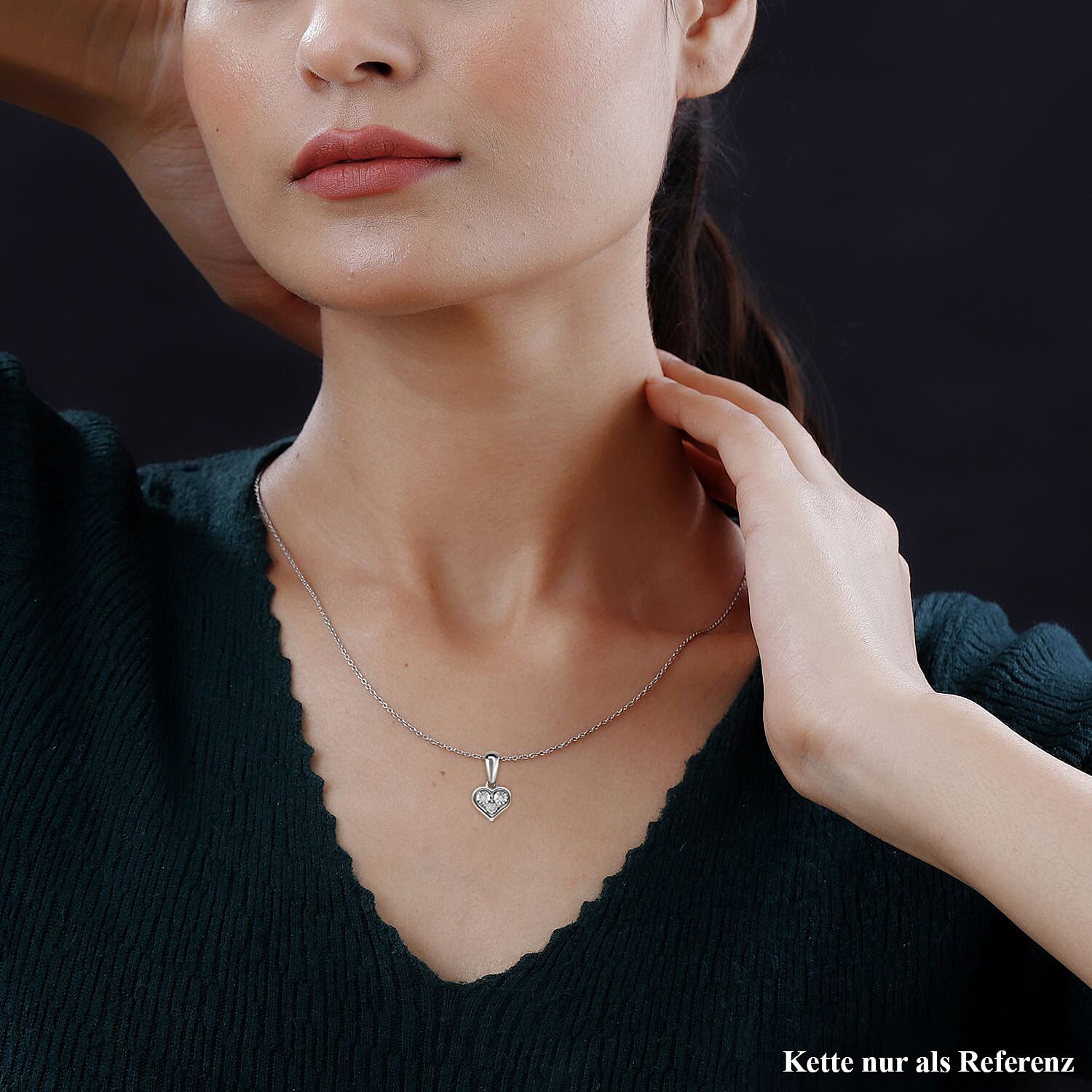 Diamond Heart Pendant in Platinum Overlay Sterling Silver.