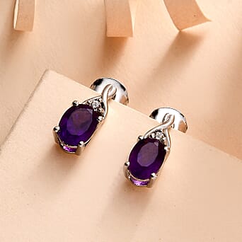 https://tjcuk.sirv.com/Products/75/4/7547669/African-Amethyst-White-Zircon-Solitaire-Stud-Push-Post-Earring-in-Plat_7547669_1.jpg?w=342&h=342