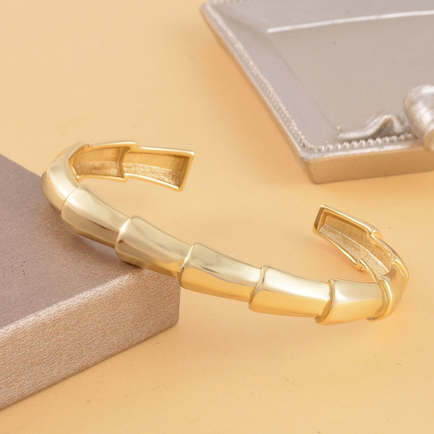 Designer Inspired Dragon Tail Pattern Adjustable Bangle in Gold Tone