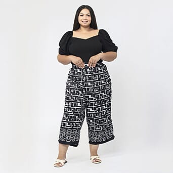 https://tjcuk.sirv.com/Products/75/5/7551495/Tamsy-100-Polyester-Cropped-Palazzo-Size-S-Inside-Leg-Lenth-53-cm-Blac_7551495.jpg?w=342&h=342