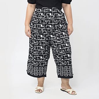https://tjcuk.sirv.com/Products/75/5/7551495/Tamsy-100-Polyester-Cropped-Palazzo-Size-S-Inside-Leg-Lenth-53-cm-Blac_7551495_1.jpg?w=342&h=342