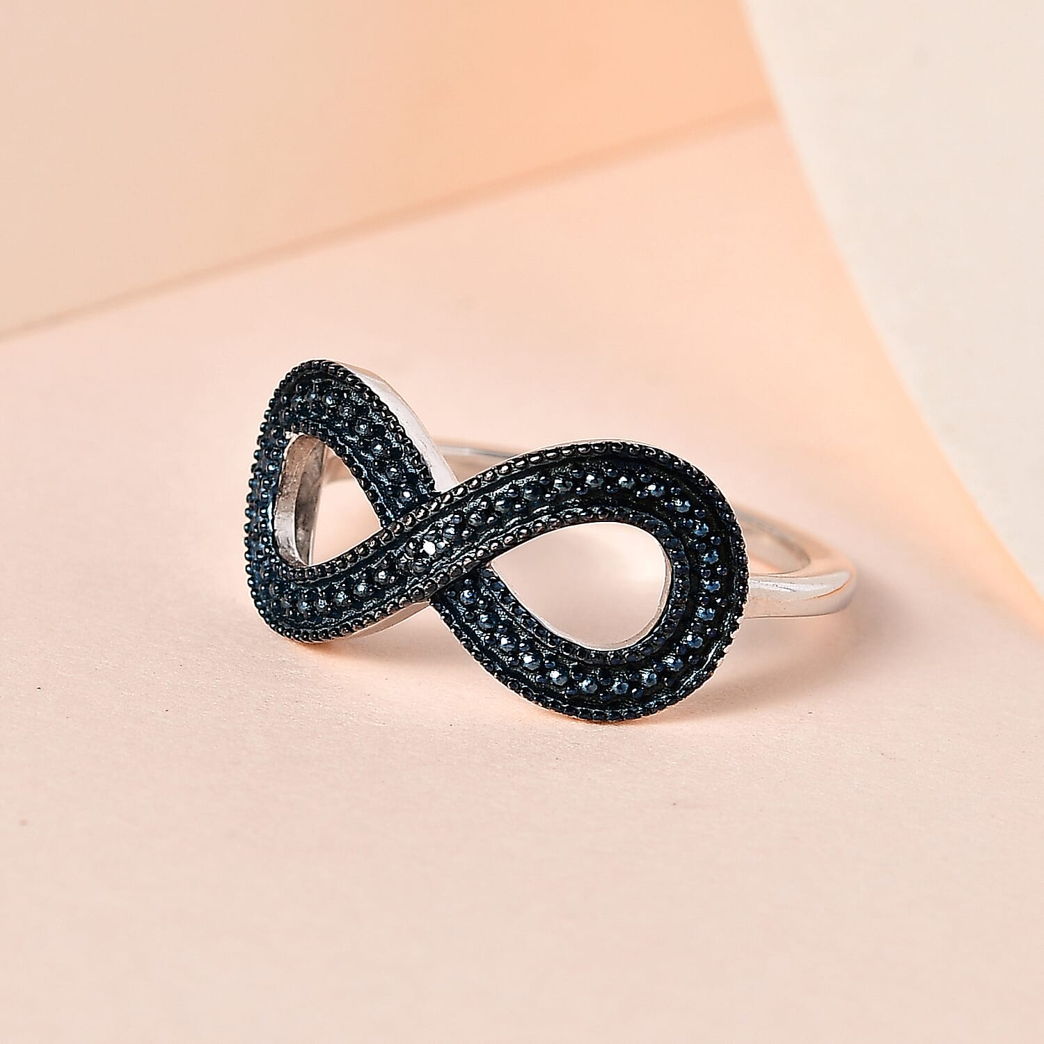 Blue Diamond Infinity Ring in Platinum Overlay Sterling Silver