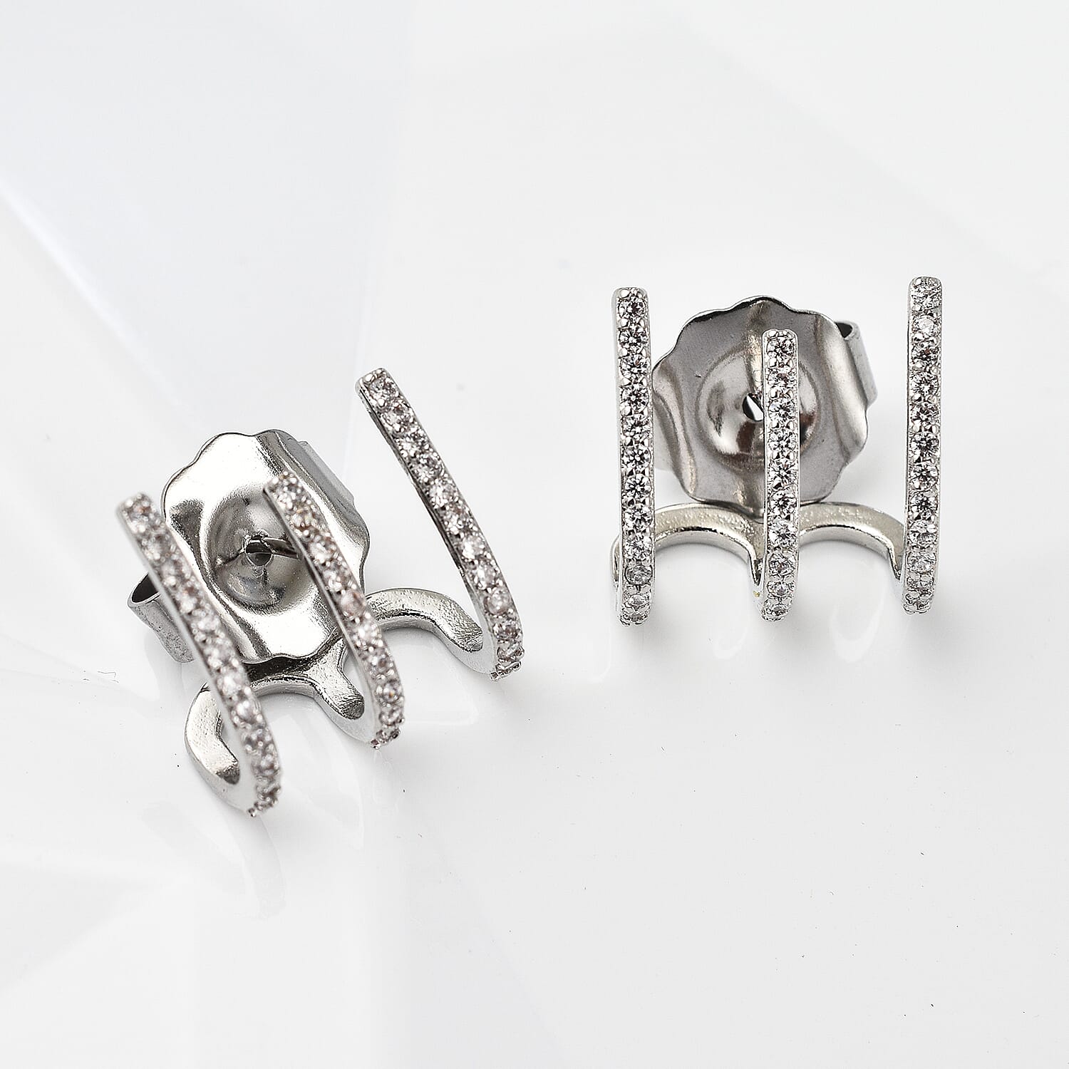 Simulate Diamod 3 Claw Cluff Earrings in Silver Tone