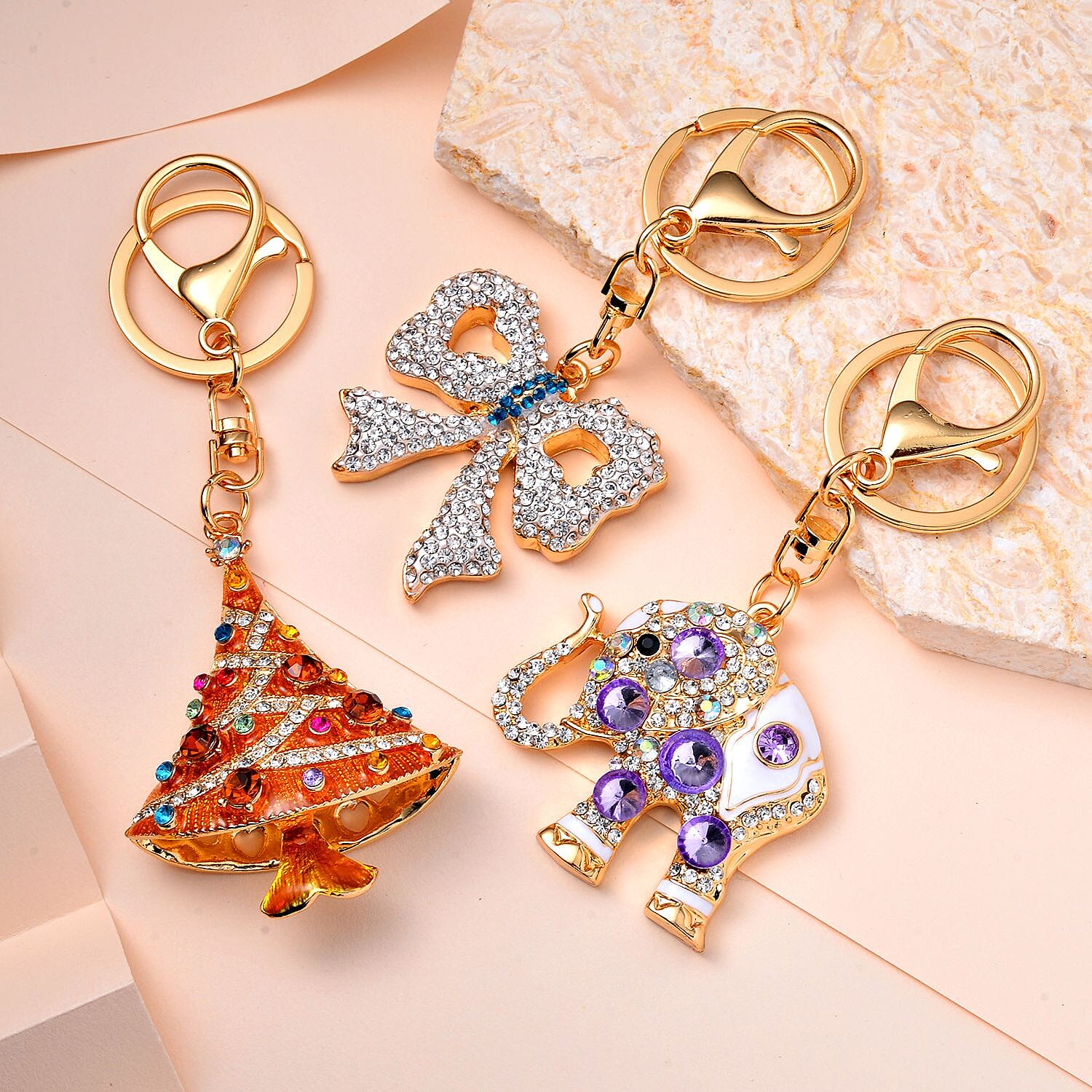 Set of 3 Sparkling Crystal Keychains With Different Designs (Bowknot, Christmas Tree, and Elephant) - Multi
