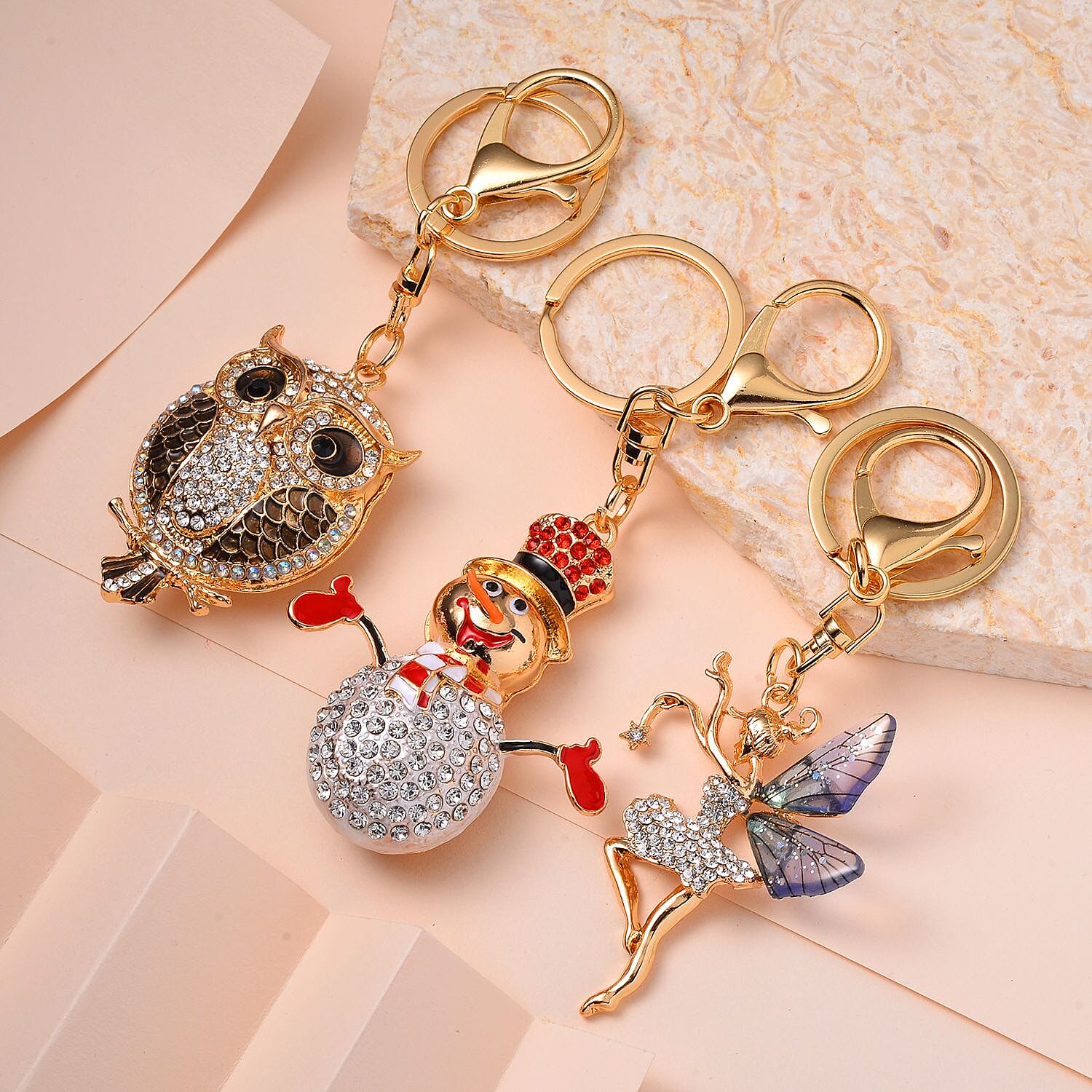 Set of 3 Sparkling Crystal Keychains With Different Designs (Snowman, Fairy, and Owl) - Multi