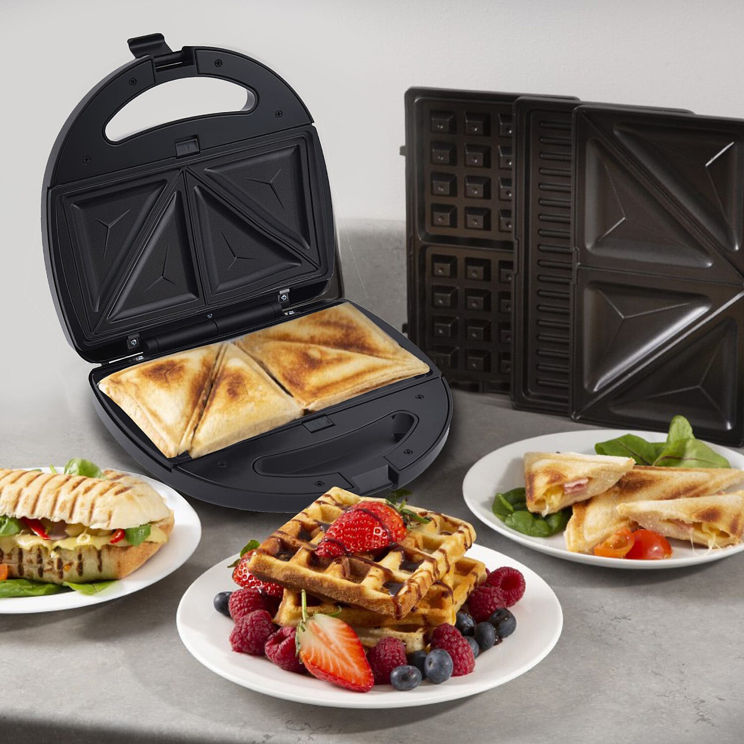 3 in 1 Non-Stick Grill, Toastie and Waffle Maker - 750W.