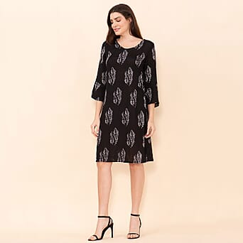 https://tjcuk.sirv.com/Products/75/9/7597509/TAMSY-Peacock-Pattern-Womens-Midi-Dress-Black-and-white_7597509_3.jpg?w=342&h=342