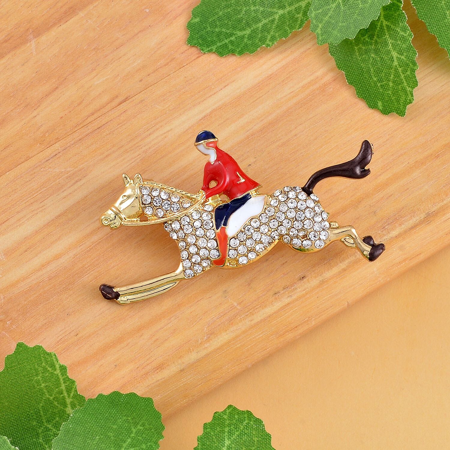 White Austrian Crystal Enamelled Horse & Rider Brooch in Yellow Gold Tone