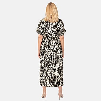 https://tjcuk.sirv.com/Products/76/2/7622018/Tamsy-Viscose-Printed-Dress-Size-99x1-cm-Beige-Black_7622018_2.jpg?w=342&h=342