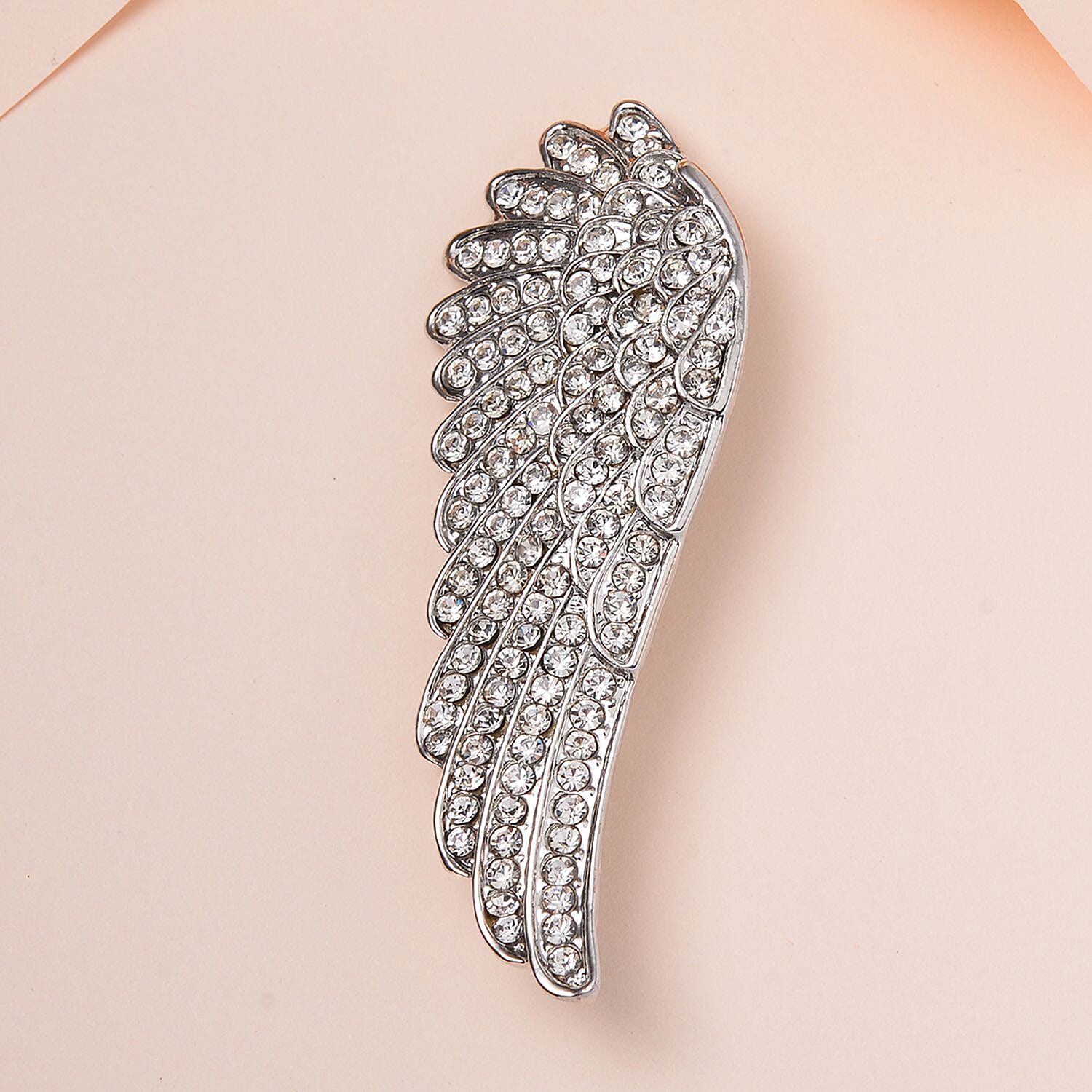 White Austrian Crystal Wing Brooch in Silver Tone