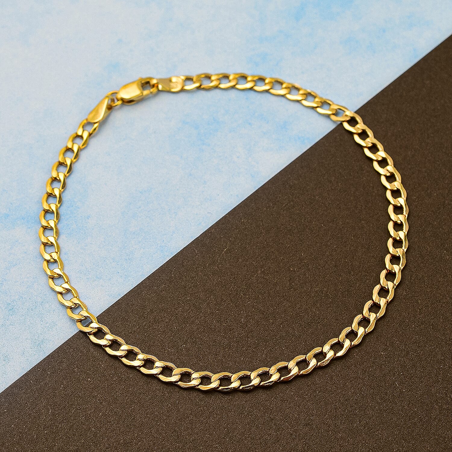 9K Yellow Gold Bevelled Flat Curb Bracelet (Size - 7.5)