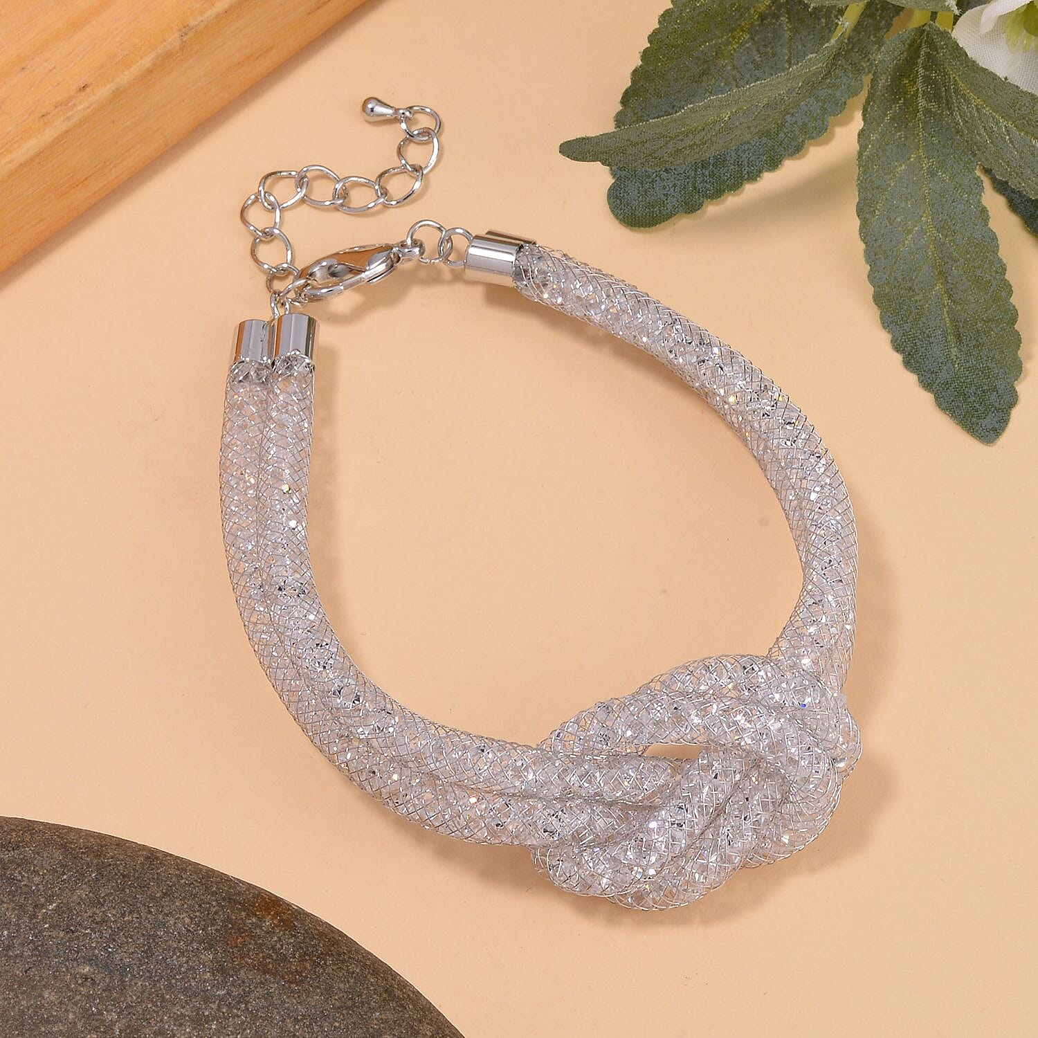 Manhattan Close Out Deal- White Austrian Crystal Knot Bracelet (Size - 7.5-2 Inch Ext.)