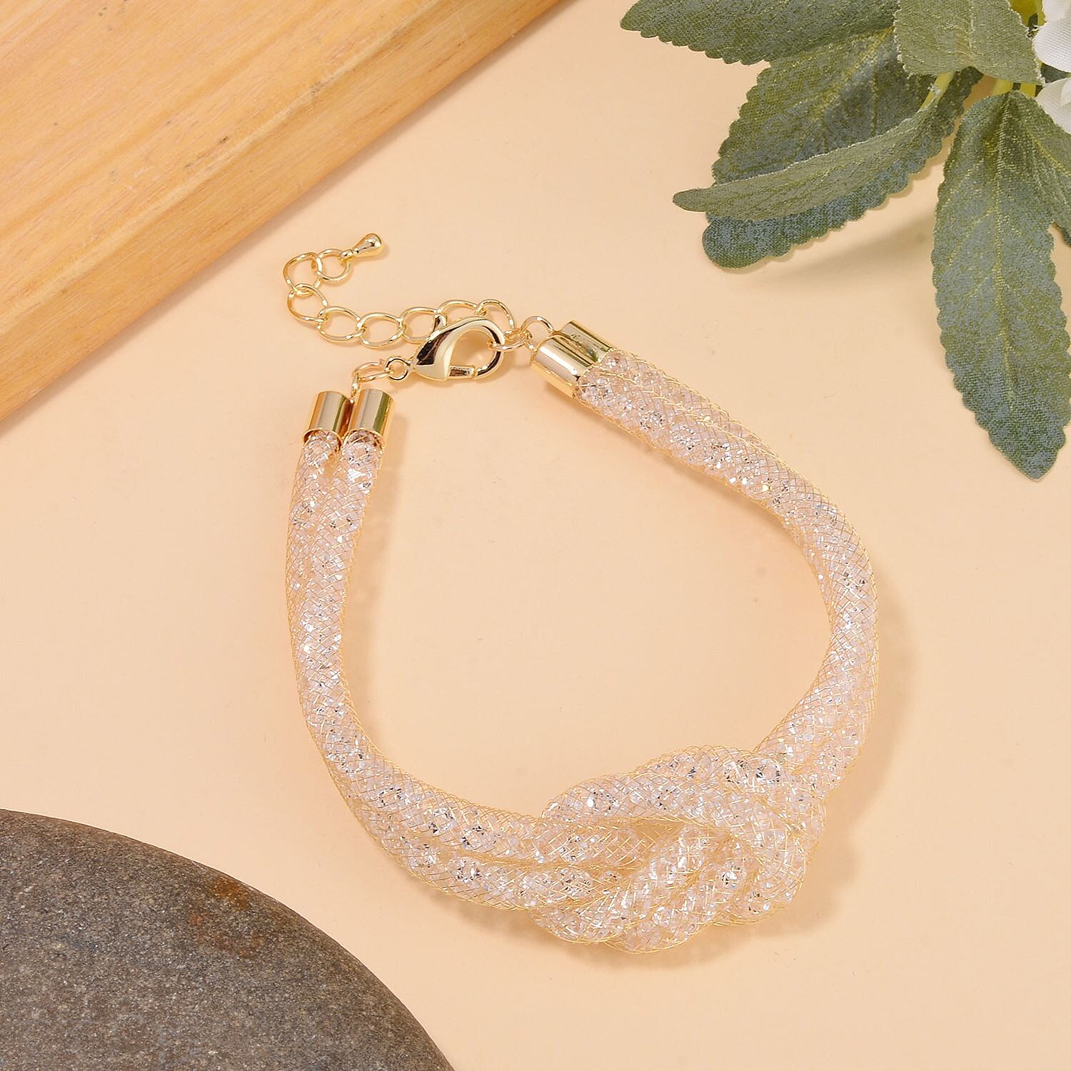 Designer Inspired - White Austrian Crystal Knot Bracelet (Size - 7.5-2 Inch Ext.)
