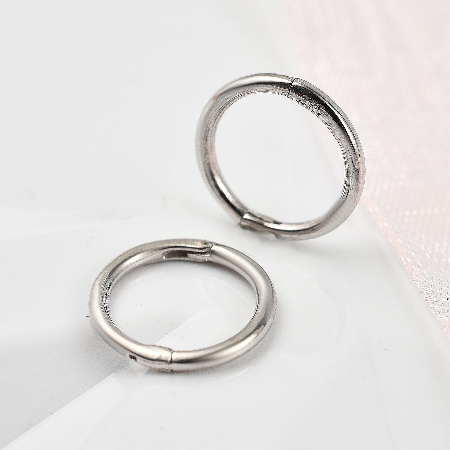 9K White Gold Huggie Earrings