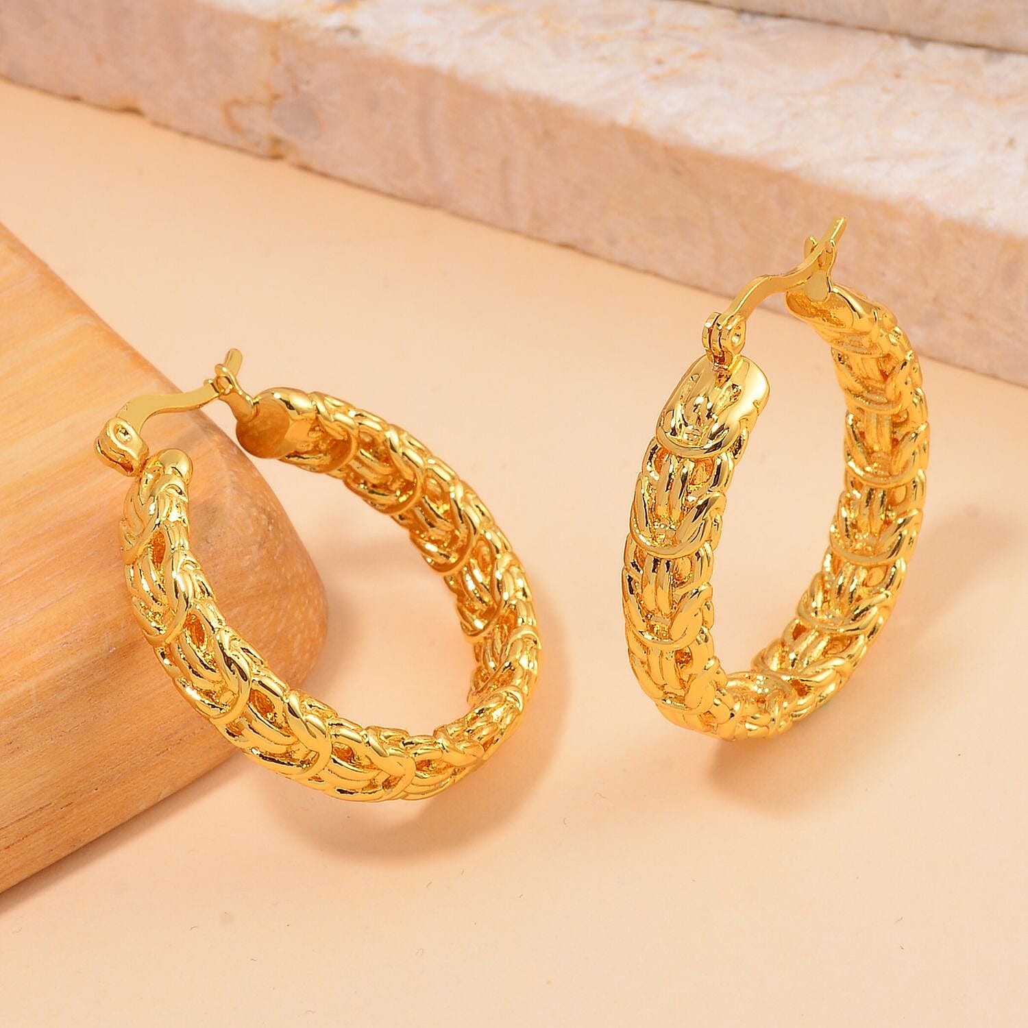 Hoop Earring with Clasp in Yellow Gold Tone