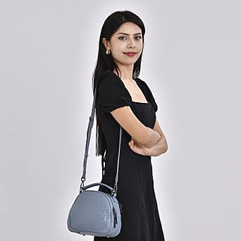 https://tjcuk.sirv.com/Products/77/1/7710162/Genuine-Leather-Circle-Crossbody-Bag-Size-24x9x17-cm-Blue_7710162_1.jpg?w=342&h=342