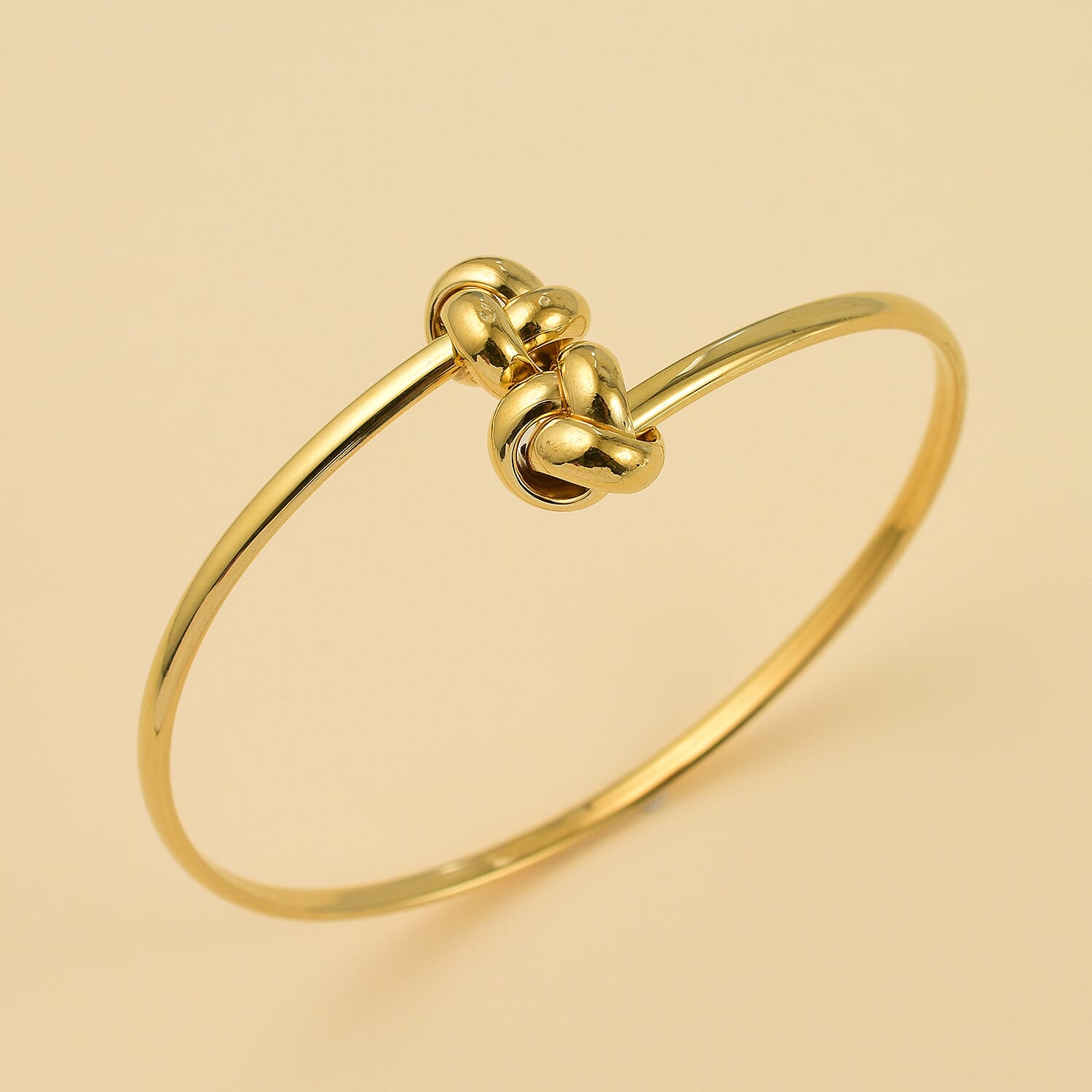 Designer Inspired -9K Yellow Gold Crossover Knot Torque Bangle (Size 7.0), Gold Wt. 3.70 Gms