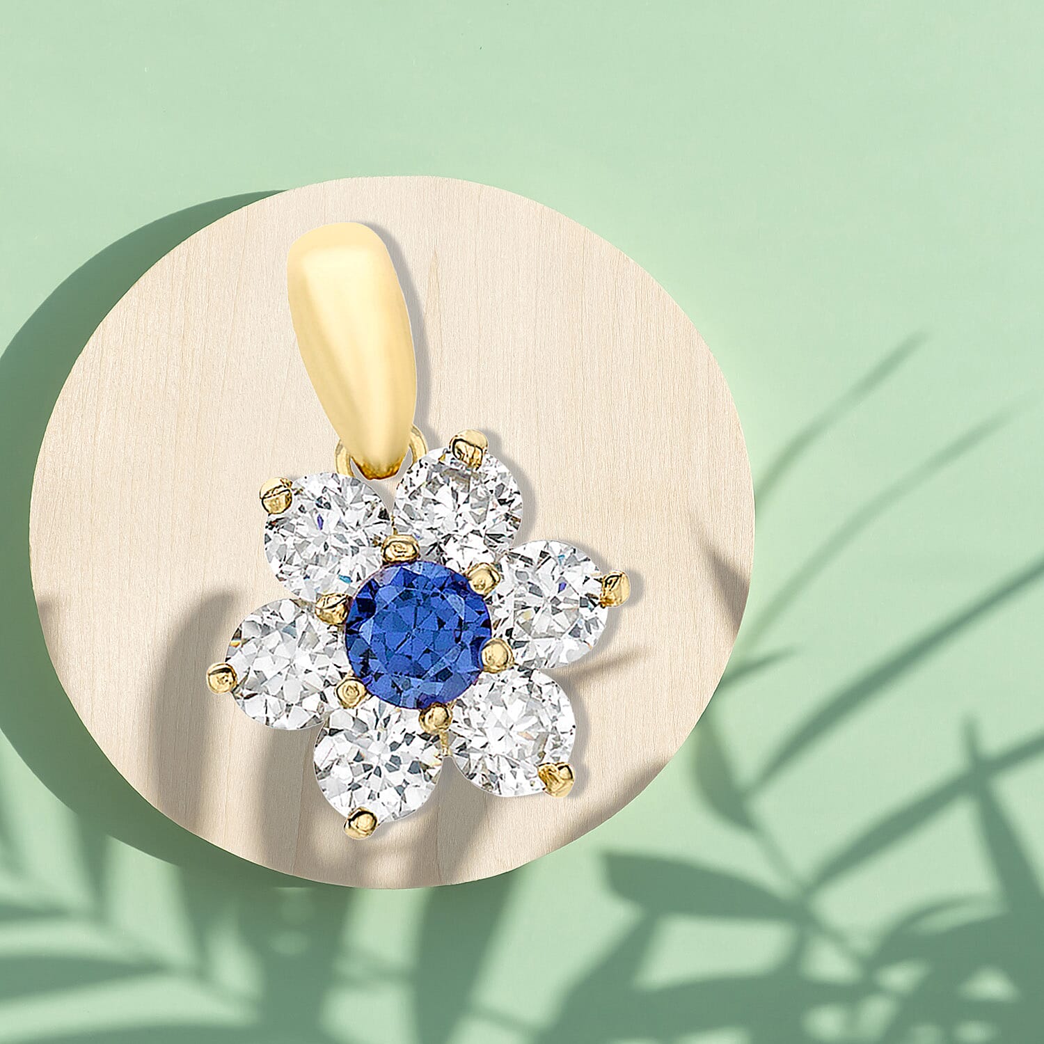 9K Yellow Gold  A   Blue Cubic Zirconia ,  Cubic Zirconia  Pendant 1.54 ct,  Gold Wt. 0.75 Gms  1.540  Ct.