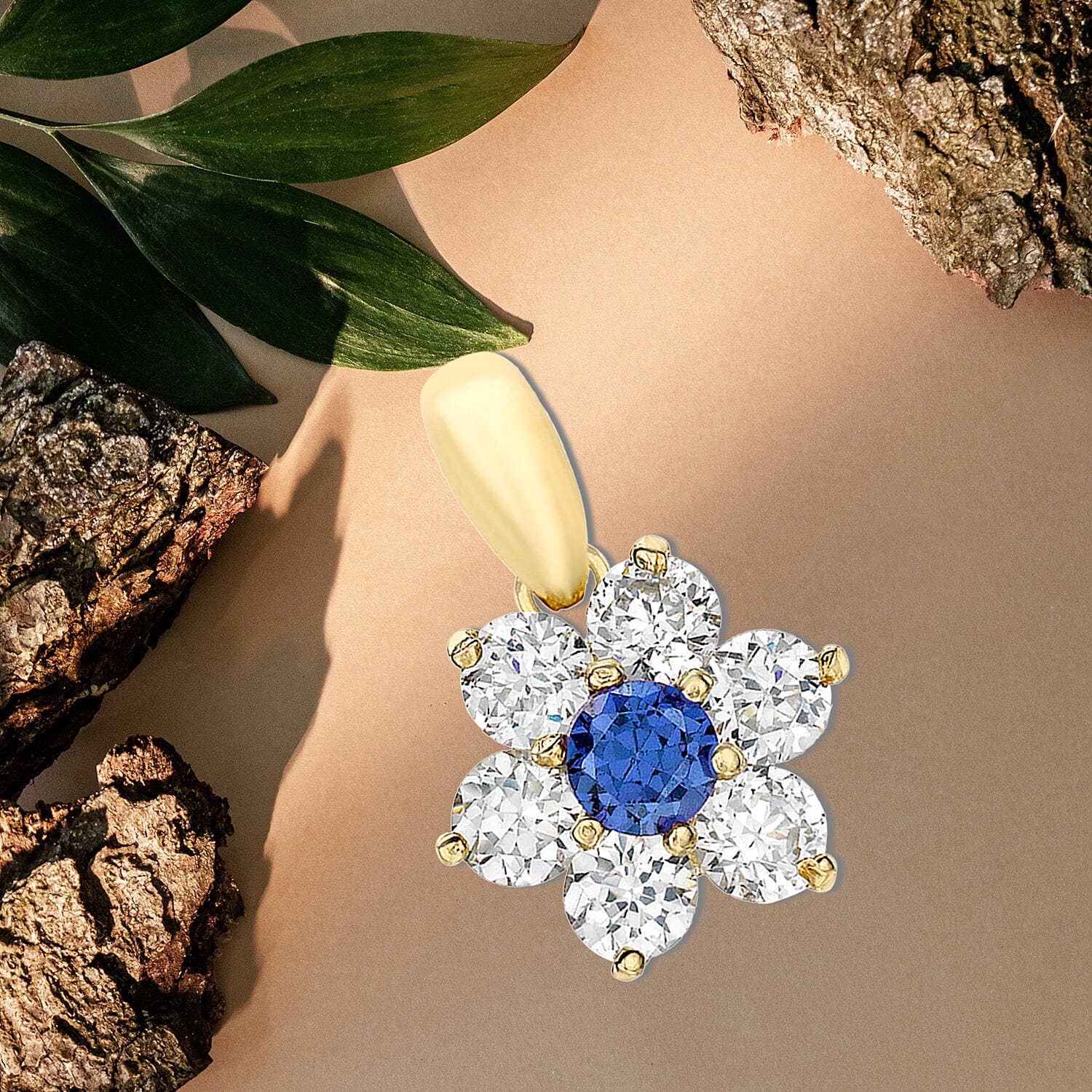 9K Yellow Gold  A   Blue Cubic Zirconia ,  Cubic Zirconia  Pendant 1.54 ct,  Gold Wt. 0.75 Gms  1.540  Ct.