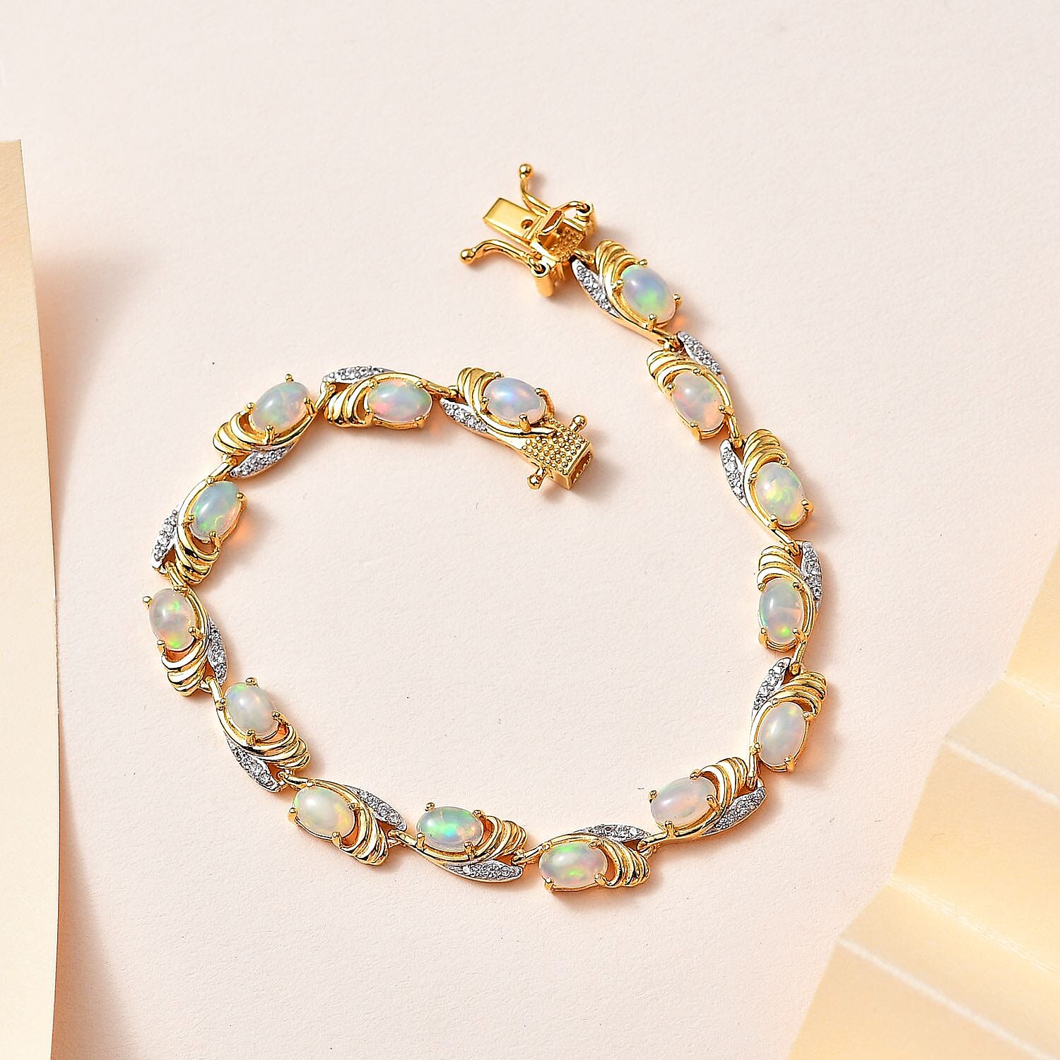 Wegeltena Ethiopian Opal & Natural Zircon Bracelet (Size 7.0) in 18K Vermeil Yellow Gold Plated Sterling Silver 4.74 Ct, Silver Wt. 10.11 Gms