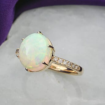 https://tjcuk.sirv.com/Products/77/4/7744675/10K-Yellow-Gold-AAA-Ethiopian-Opal-White-Diamond-I2-Ring-2-85-ct-Gold-_7744675_1.jpg?w=342&h=342