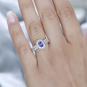 https://tjcuk.sirv.com/Products/77/6/7767383/Tanzanite-White-Zircon-Main-Stone-With-Side-Stone-Ring-in-Platinum-Ove_7767383_2.jpg?w=342&h=342