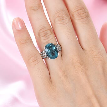 https://tjcuk.sirv.com/Products/78/0/7807570/Teal-Fluorite-White-Zircon-Main-Stone-With-Side-Stone-Ring-in-rhodium-_7807570_2.jpg?w=342&h=342