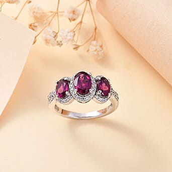 https://tjcuk.sirv.com/Products/78/1/7814830/Purple-Garnet-White-Zircon-Main-Stone-With-Side-Stone-Ring-in-rhodium-_7814830_1.jpg?w=342&h=342