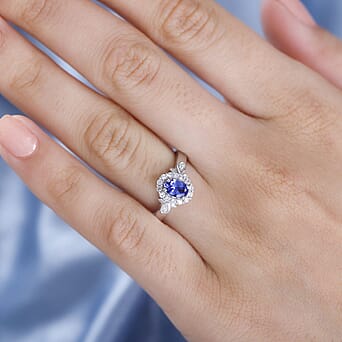 https://tjcuk.sirv.com/Products/78/1/7818691/Tanzanite-White-Zircon-Main-Stone-With-Side-Stone-Ring-in-rhodium-Ster_7818691_2.jpg?w=342&h=342