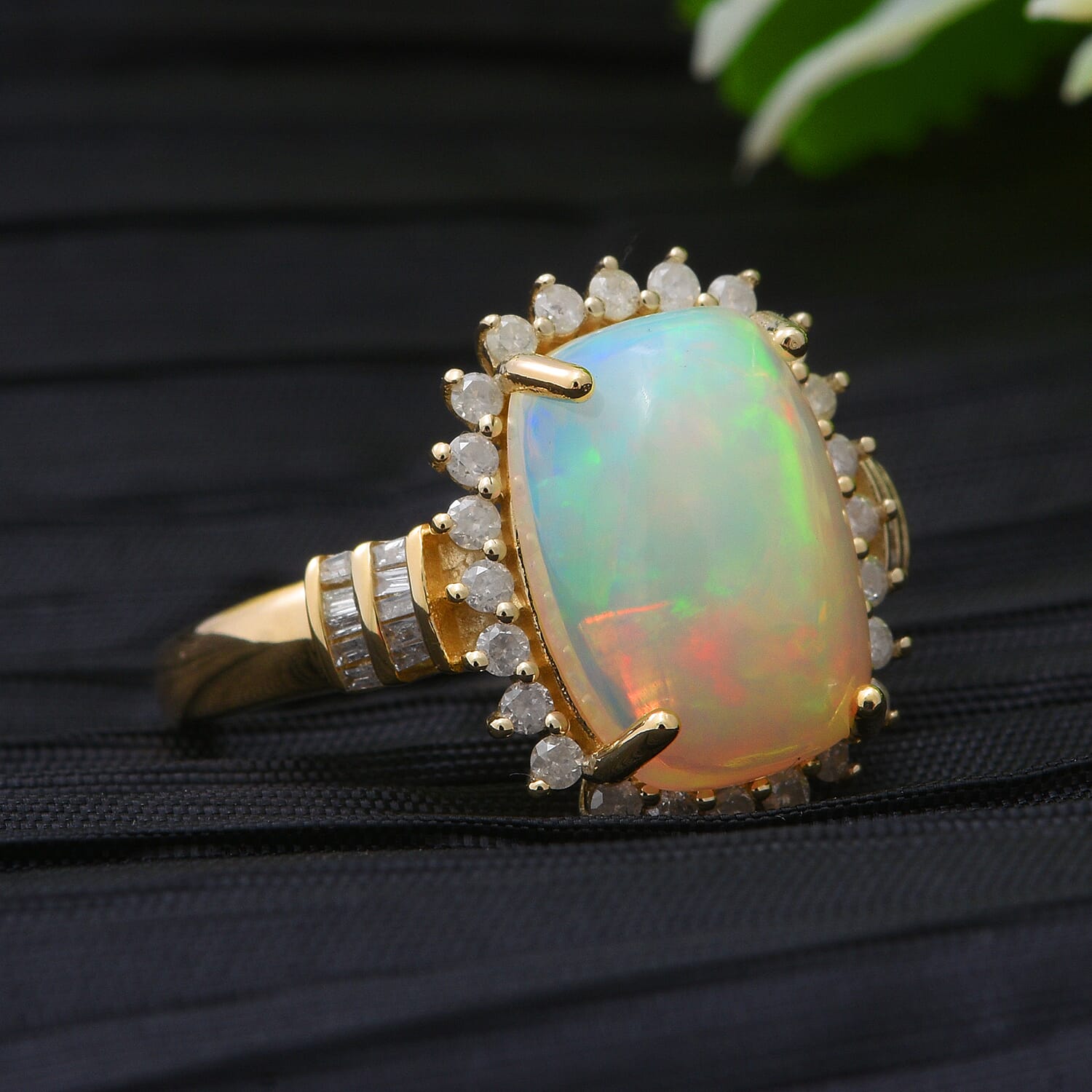 9K Yellow Gold Ethiopian Welo Opal (4.20 Ct) and Diamond Halo Ring 4.64 Ct.