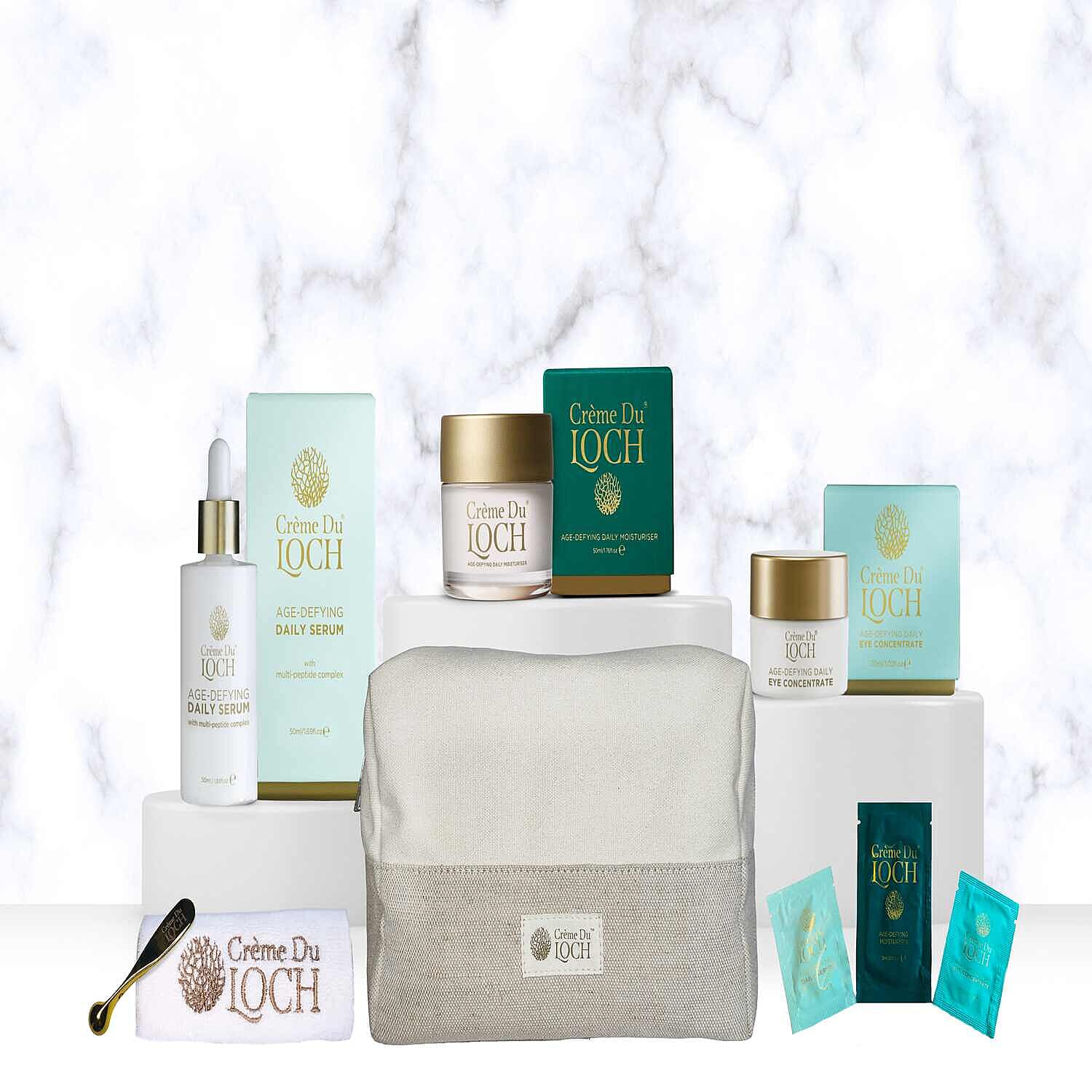 Creme Du Loch Age-Defying Ritual Set (Includes Daily Serum 50ml, Daily Moisturiser 50ml, Eye Conc. 30ml, Spatula, Cleansing Cloth, Ritual Bag & 5ml Moisturiser, 2ml Serum, 2ml Eye Conc.)