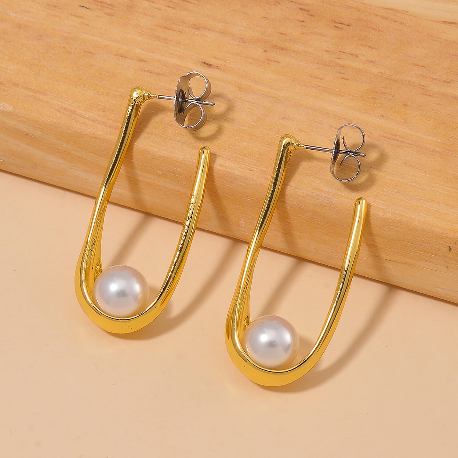White Shell Pearl Earrings in Goldtone