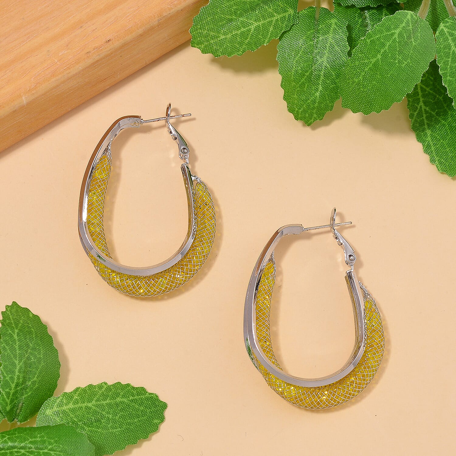 NY Closeout Deal- Star Light Crochet Austrian Yellow Crystal Hoop Earrings in White Tone